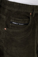 Reell Baggy Dark Green Cord – baggy fit broek in donkergroene corduroy met ribstructuur en klassiek 5-pocket design