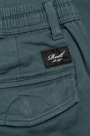 Reell Reflex Easy Cargo Steel Blue – tapered fit cargobroek in staalblauw Flex Twill met elastische tailleband en dubbele cargozakken