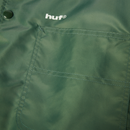HUF x Thrasher Logo Jacket – donkergroen nylon jack met groot HUF x Thrasher-logo op de rug en sleeve-prints, waterafstotend en met meshvoering
