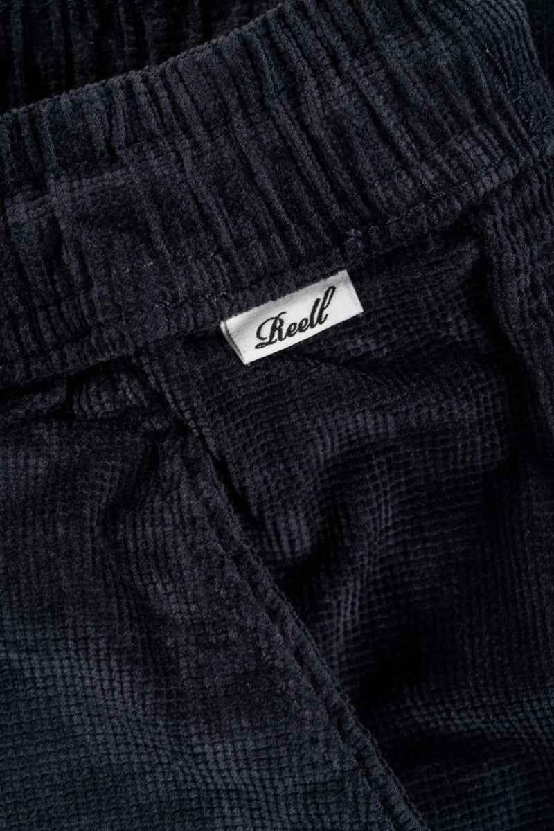 Reell Reflex Loose Chino Deep Navy Square Cord – loose fit chino van corduroy met elastische tailleband en deep navy kleur