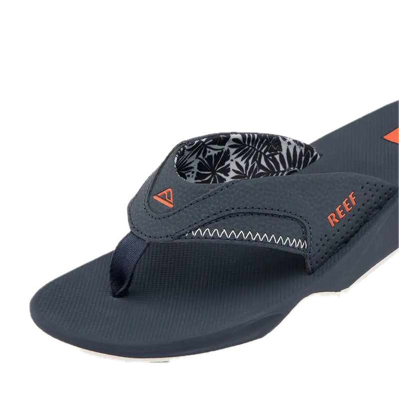 Koop de Reef Fanning Navy Orange Tropic veilig en snel bij Revert 95 online of kom hem checken in de winkel in Haarlem.