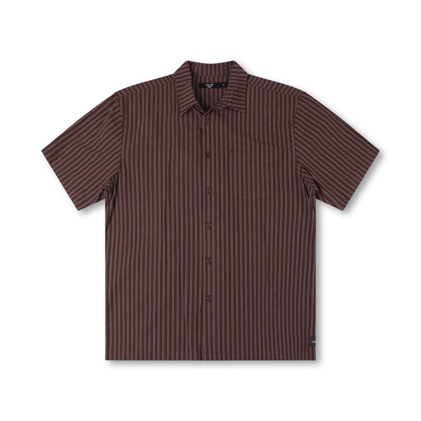 Koop de Former Reynolds Stripe SS Shirt Brown veilig en snel bij Revert 95 online of kom hem checken in de winkel in Haarlem.