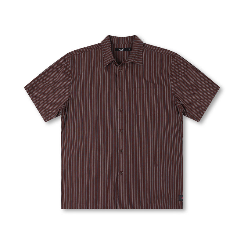 Koop de Former Reynolds Stripe SS Shirt Brown veilig en snel bij Revert 95 online of kom hem checken in de winkel in Haarlem.