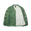 HUF x Thrasher Logo Jacket – donkergroen nylon jack met groot HUF x Thrasher-logo op de rug en sleeve-prints, waterafstotend en met meshvoering