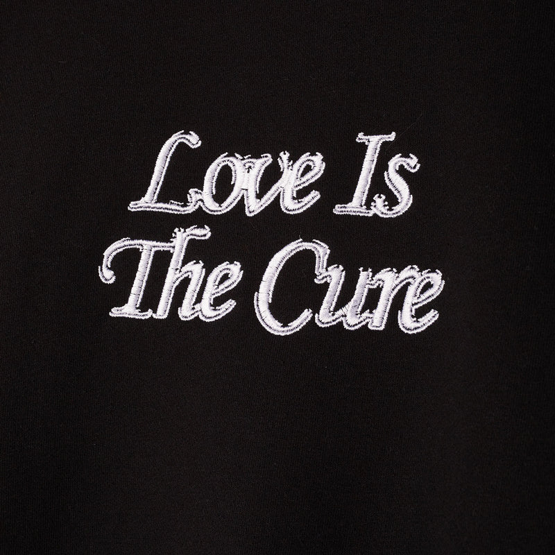 LOVE IS THE CURE CREWNECK